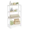 A white bamboo shelf unit filled with various bathroom and household items. Produktbild-Vorschau