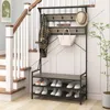 An entryway hall tree with a bench and shoe storage, placed near a staircase and a wall. Voir les images du produit