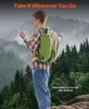 A person wearing a backpack in a mountainous forest setting. Anteprima dell’immagine prodotto