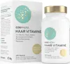 A product shot of a box and bottle of hair vitamins. Produktbild-Vorschau