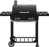 A black Royal Gourmet charcoal grill is shown from the front on a white background. Produktbild-Vorschau