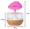 A humidifier with a cloud-shaped top that emits mist, with dimensions indicated. Náhled obrázku produktu