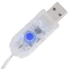 A close-up of a USB connector with a blue button. Produktbild-Vorschau