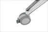Close-up of a caster wheel attached to a chrome leg of a piece of furniture, likely a table, against a white background. Anteprima dell’immagine prodotto