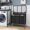 A laundry room with a washing machine and a laundry sorter. Produktbild-Vorschau