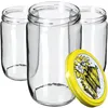 Three clear glass jars are arranged with one yellow lid in the foreground. Produktbild-Vorschau