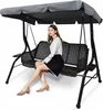 A woman sits on a garden swing chair. Produktbild-Vorschau
