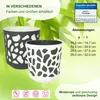 Two plant pots with a decorative cutout pattern, set against a backdrop of green bamboo leaves and text overlays. Produktbild-Vorschau