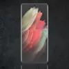 A smartphone with a colorful wallpaper displayed on its screen, set against a dark, textured background. Produktbild-Vorschau