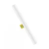 A white LED tube light with a yellow clip, isolated on a white background. Náhľad obrázku produktu