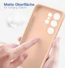 A hand is touching a pink phone case, highlighting its matte surface and soft grip. Produktbild-Vorschau