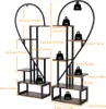 A diagram showing the dimensions and weight capacity of a heart-shaped plant stand. Produktbild-Vorschau