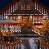 A house decorated with Christmas lights and trees for the holidays. Náhled obrázku produktu
