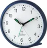 A close-up view of a blue analog alarm clock with a white face. Anteprima dell’immagine prodotto