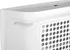 A close-up view of the top corner of a white dehumidifier, showing a handle and a perforated grille. Náhled obrázku produktu