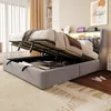A bedroom scene with a bed that has its storage compartment open. Produktbild-Vorschau