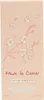 A pink box with cherry blossom illustrations and product details. Náhled obrázku produktu
