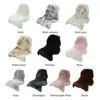 A collage of different colored sheepskin rugs. Produktbild-Vorschau
