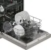 The inside of a dishwasher with dishes loaded. Produktbild-Vorschau