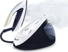 A steam generator iron and its base are shown on a white background, with steam coming from the iron. Anteprima dell’immagine prodotto