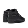 A pair of black high-top Reebok sneakers shown from the back and side. Produktbild-Vorschau