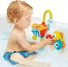 A young child is playing with a bath toy in a bathtub. Podgląd zdjęcia produktu