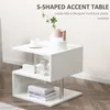 A white S-shaped accent table with decorative items on it, set against a light-colored wall and wooden floor. Produktbild-Vorschau