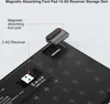 A close-up view of the underside of a keyboard, showing the storage slot for a 2.4G receiver and a magnetic absorbing foot pad. Produktbild-Vorschau