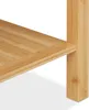 A close-up view of a wooden shelf and its support leg. Voir les images du produit