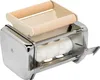 A close-up studio shot of a pasta maker attachment. Voir les images du produit