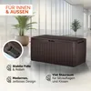 A brown storage box is shown in a modern indoor setting with plants and large windows. Produktbild-Vorschau