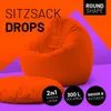 A bright orange beanbag chair and a matching cushion are shown against a vibrant orange and purple background. Text overlays highlight product features and branding. Voir les images du produit