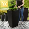 A person is watering plants in large black planters on a wooden deck. Náhľad obrázku produktu