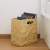 Knitterbox in papierbraun mit Büchern, dekorativ platziert – kreative Aufbewahrungslösung Produktbild-Vorschau
