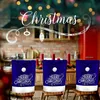 A festive Christmas-themed dining room scene with decorated chairs. Produktbild-Vorschau