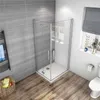 A modern bathroom with a corner shower enclosure, tiled walls, and wooden flooring. Produktbild-Vorschau