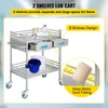 A stainless steel lab cart with two shelves and two drawers, stocked with medical supplies. The cart has wheels and a blue bucket attached. Produktbild-Vorschau