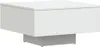 A white square coffee table with a gray base, shown from a front-side angle against a white background. Voir les images du produit
