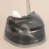 Close-up of a handheld steamer's water tank with fill lines. Náhľad obrázku produktu