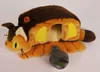 A plush toy of the Catbus from My Neighbor Totoro, with a small mouse toy attached by a string. Voir les images du produit