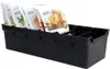 A black plastic organizer tray holding several packets of spices or seeds. Anteprima dell’immagine prodotto