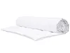 A white duvet rolled up and partially unrolled on a white background. Podgląd zdjęcia produktu