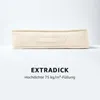 A cream-colored cushion with a handle on a white background. Produktbild-Vorschau