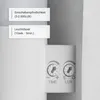 Close-up of a white electronic device with two adjustment dials and informational text boxes. Produktbild-Vorschau