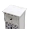 Close-up view of the top part of a white wooden cabinet with drawers. Anteprima dell’immagine prodotto