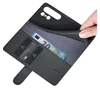 A hand is holding open a black leather wallet-style phone case, revealing credit cards and a 20 Euro banknote inside. Produktbild-Vorschau