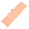 A single peach-colored vacuum cleaner bag is shown diagonally on a white background. Produktbild-Vorschau