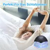 A woman stretching in bed next to an air purifier. Produktbild-Vorschau