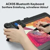 A person's hands are using a drawing tablet and a Bluetooth keyboard accessory. Podgląd zdjęcia produktu