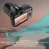 A digital camera is shown in a marketing image with a beach background and text highlighting its features. Náhled obrázku produktu